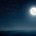 Virgo Full Moon over distant mountains