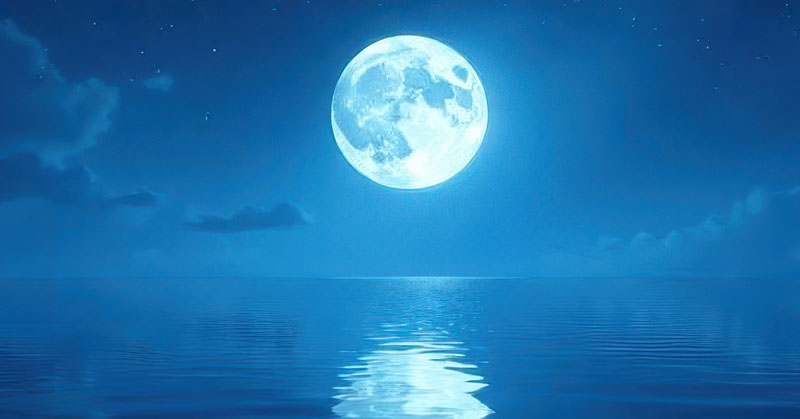 Aquarius Full Moon, 2025. Bright full moon shining and reflecting over a vast body of water.